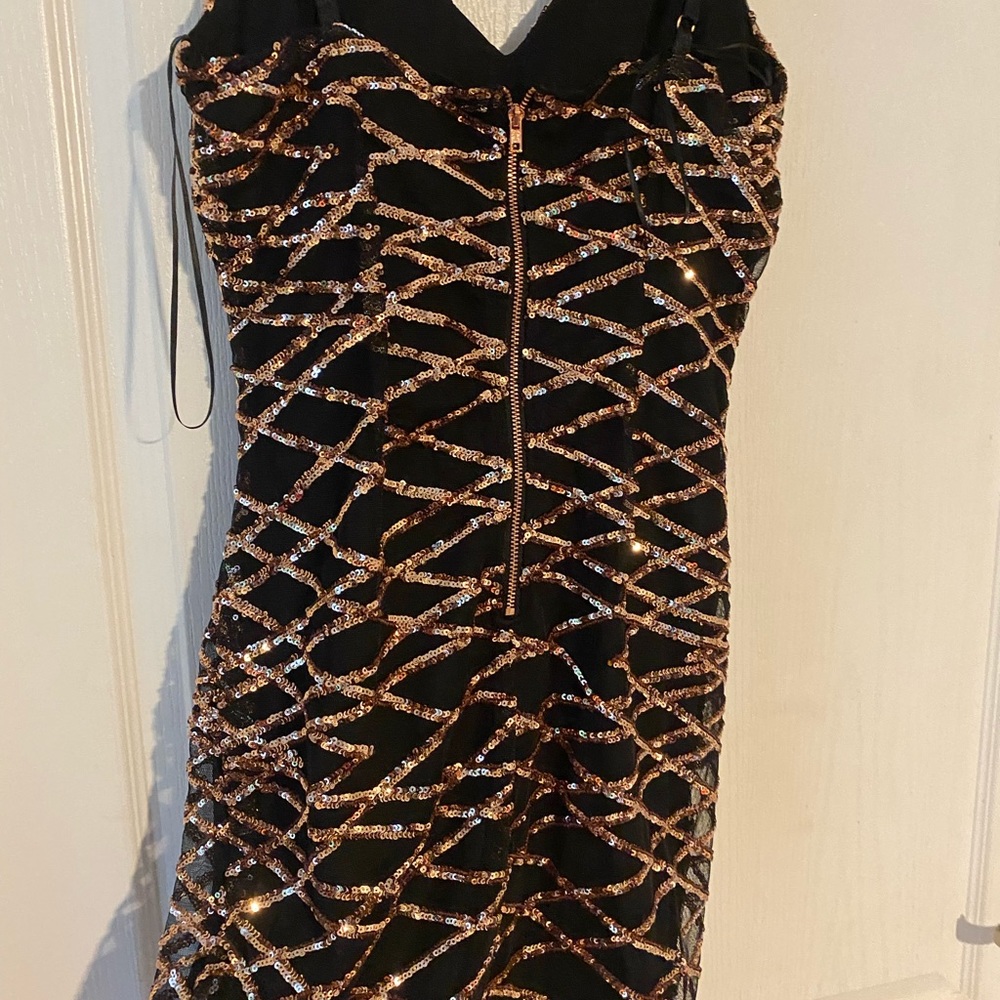 2 dresses perfect for NYE party .